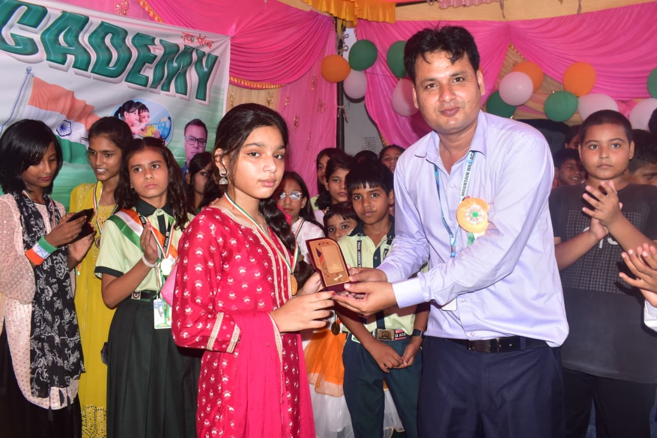 Award presentation at Mountain Hill Academy